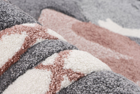 Soft pink rug with whimsical fairy design for children’s rooms